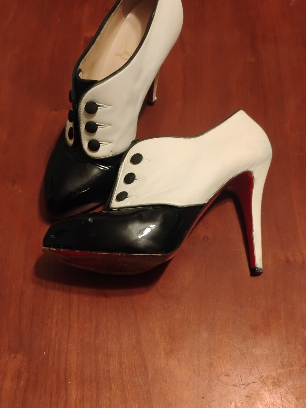 Christian Louboutin Esoteri Two-Tone Black and White Button Stiletto Pumps